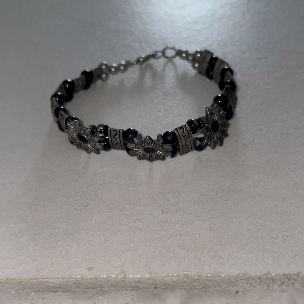 Black and grey metal bracelet